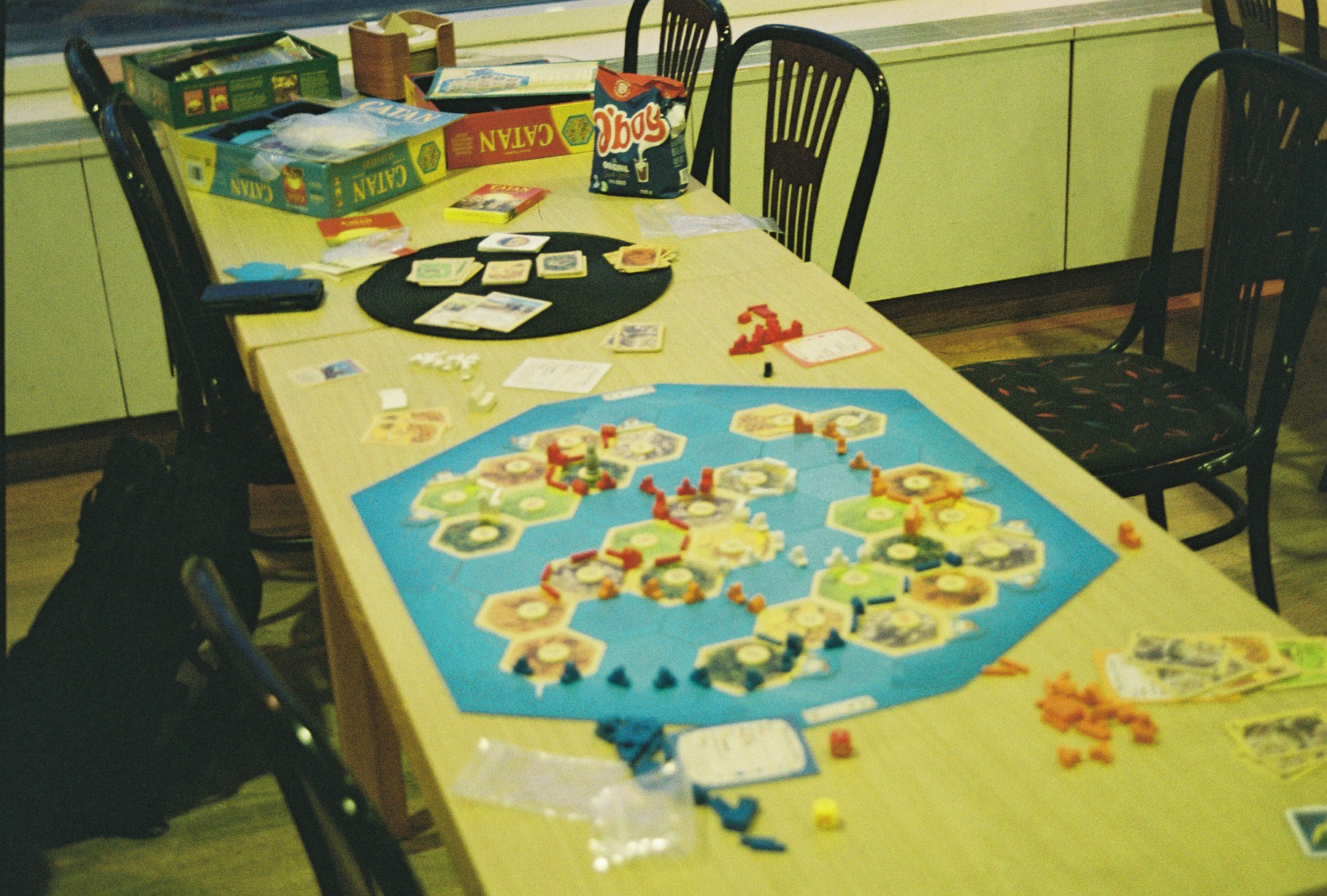 Various board games scattered on a table